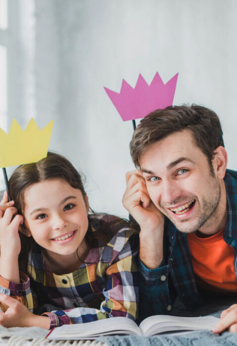 Daughter crafted a purple crown from paper for her father
